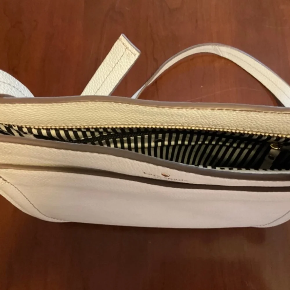 Kate Spade NY Orchard Street
Hemsley Pebbled Leather Handbag
Bright White - Picture 13 of 16